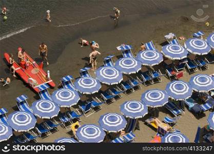 High angle view of tourists on the beach, Marina Grande, Capri, Sorrento, Naples Province, Campania, Italy