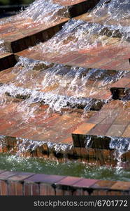 High angle view of water flowing down a tiled surface