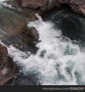 High angle view of water flowing through rocks, St Mary Falls, Glacier National Park, Glacier County, Montana, USA