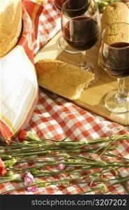 High angle view of wineglasses with bread on a tray