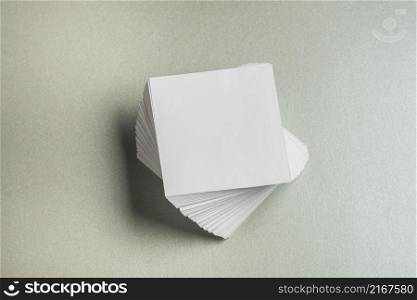 high angle view stacked square shaped paper