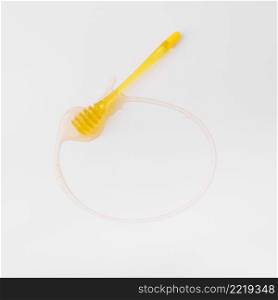 high angle view sweet honey dipper white backdrop
