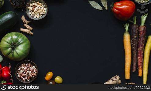 high angle view various raw vegetables black background