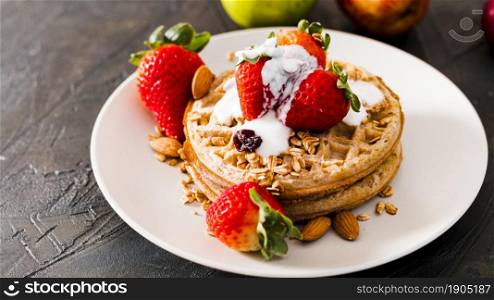 high angle waffles with strawberries yogurt. Beautiful photo. high angle waffles with strawberries yogurt