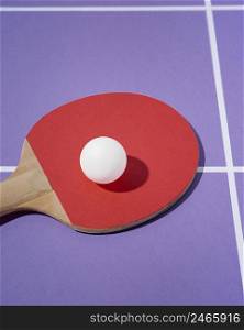 high angle white ball ping pong paddle
