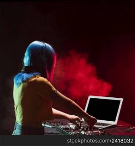 high angle woman dj mixing audio console
