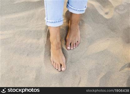 high angle woman feet sand beach. High resolution photo. high angle woman feet sand beach. High quality photo