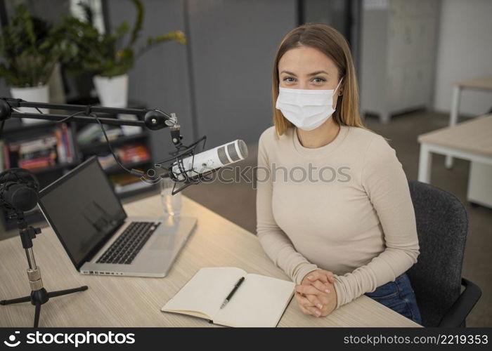 high angle woman with medical mask radio studio