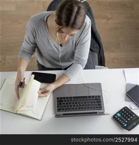 high angle woman working indoors