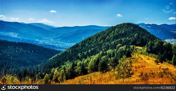 High beautiful mountains covered with fresh green fir trees, wonderful panoramic view, beautiful autumn nature of Carpathians, Ukraine&#xA;