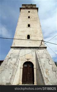 High bell tower of church in Skradi, Croatia