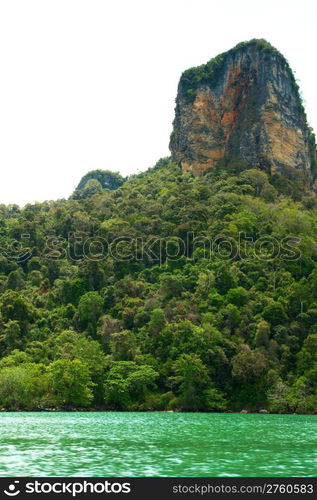 High cliffs on the tropical island. Exotic tropical landscape.