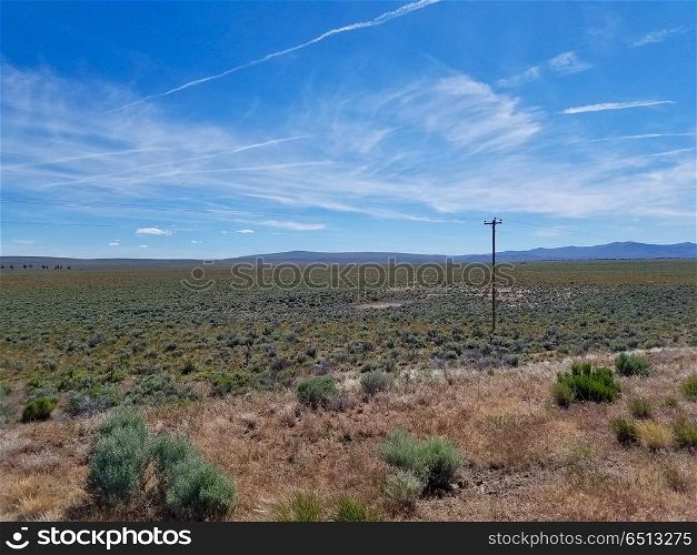 High desert plains in central Oregon, USA. High desert plains from the Central Oregon Highway, USA