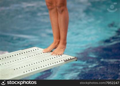 High diver jumping into the water