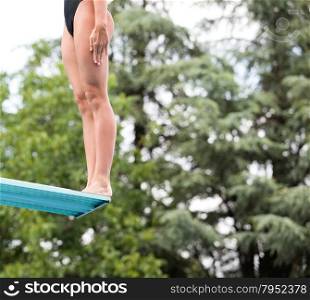 High diver jumping into the water