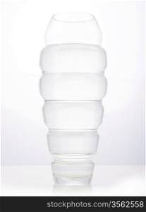 High glass transparent flowerpot vase over white background