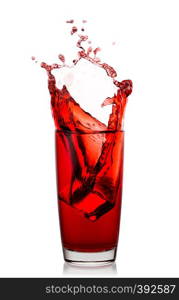 High glass with a splash of natural cherry juice isolated on a white background. High glass with splash of natural cherry juice