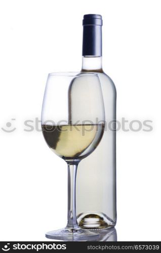 High glass with still white wine and wine bottle isolated on white background. Glass of white wine