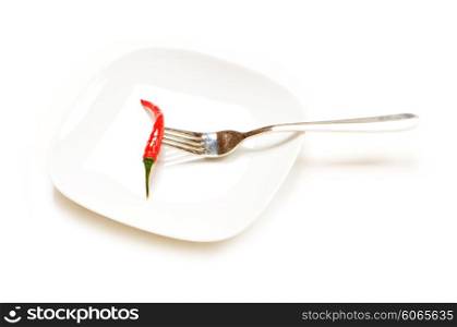 High-key image of red pepper isolated on white