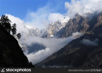 High mountain and clouds in Nepal