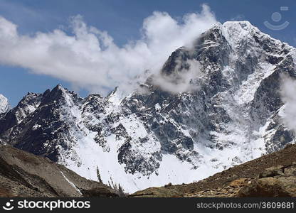 High mountains in cloud. Nepal. Everest