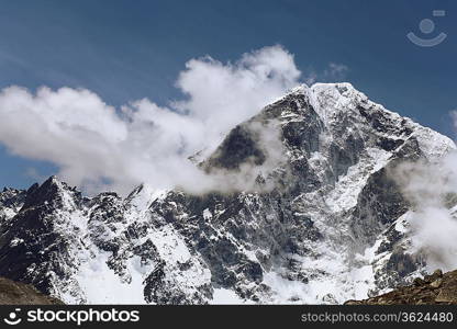 High mountains in cloud. Nepal. Everest