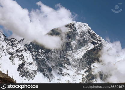 High mountains in cloud. Nepal. Everest