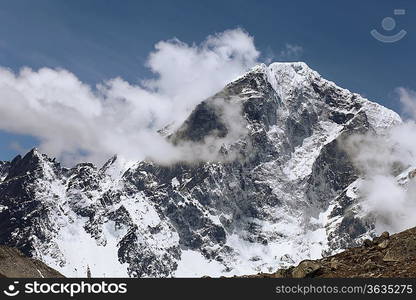 High mountains in cloud. Nepal. Everest