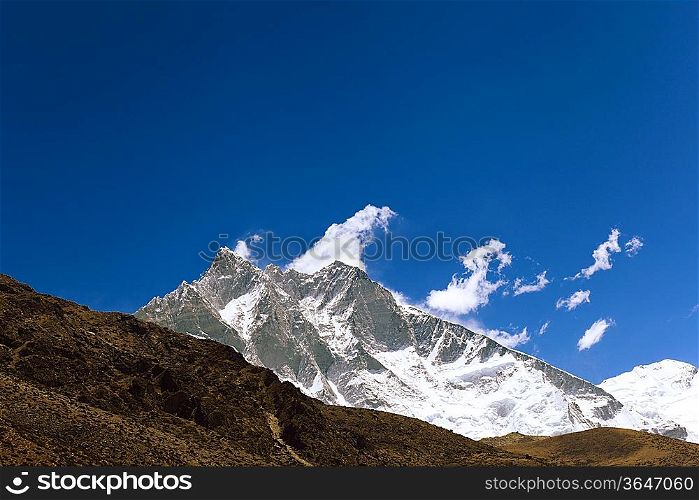 High mountains in cloud. Nepal. Everest