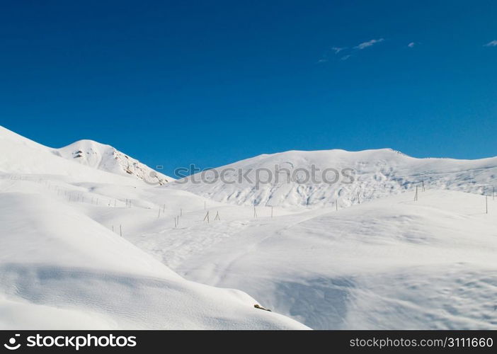 High mountains under snow in the winter