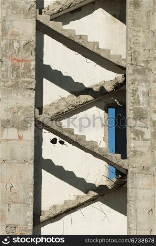 High old demolished building. Concrete stairs