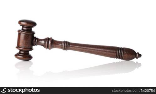 High quality mahogany wooden gavel isolated on white with natural reflection.