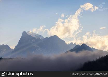 High rocky mountain ridge at sunset. Dolomites Alps, Italy