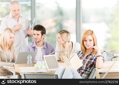 High-school or university young study group with mature professor