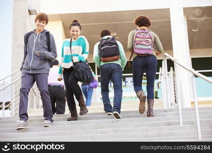 High School Pupils On Steps Outside Building