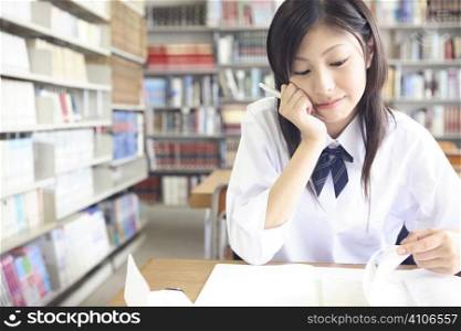 High school student in a library