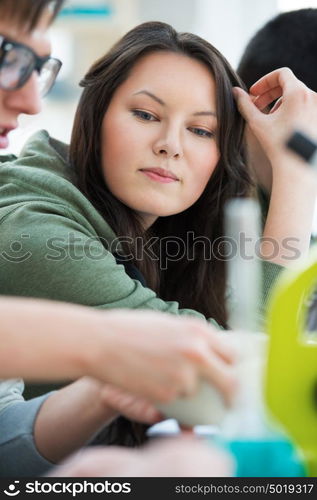 High School students. Group of students working together at laboratory class.