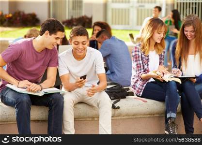 High School Students Hanging Out On Campus