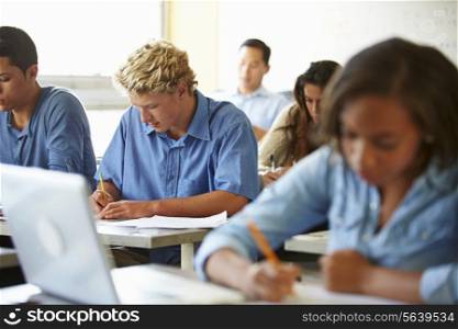 High School Students Taking Test In Classroom