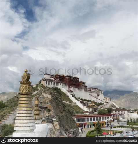 High section view of stupa with Potala Palace in the background, Lhasa, Tibet, China