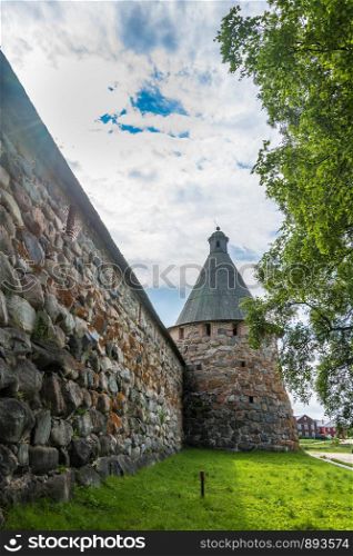 High stone wall of the Spaso-Preobrazhensky Solovetsky monastery, Arkhangelsk oblast, Russia.