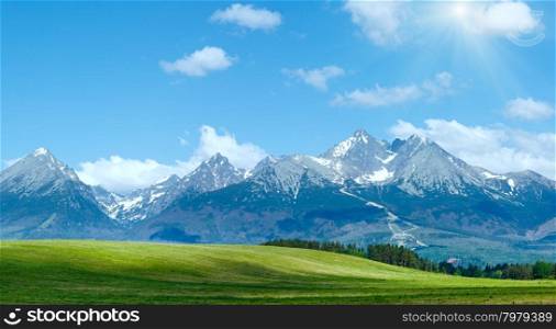 High Tatras spring panorama with snow on mountainside (Slovakia)