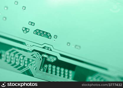 High-tech background. Electronic circuit board. Macro. Selective focus.