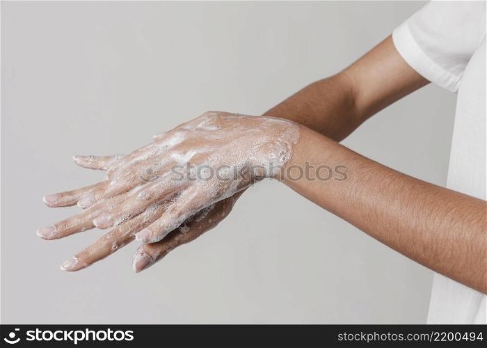 high view hygiene concept washing hands with soap