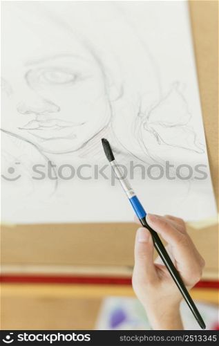 high view portrait woman paint brush