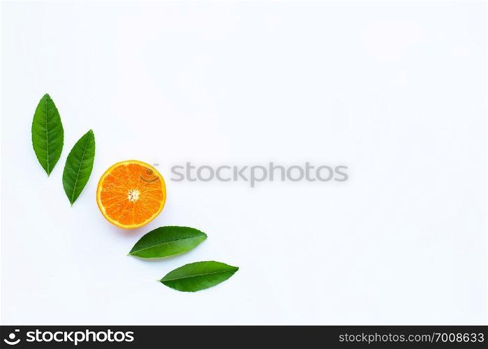High vitamin C,  Fresh orange citrus fruit with green leaves on white background. Copy space
