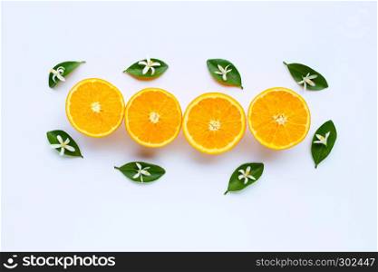 High vitamin C. Fresh orange citrus fruit with leaves and flower isolated on white background. Copy space