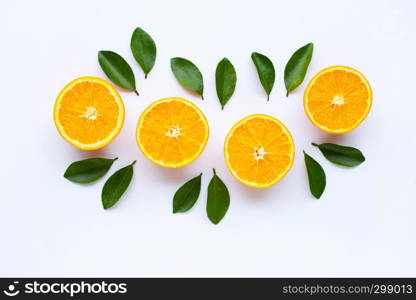 High vitamin C. Fresh orange citrus fruit with leaves isolated on white background.