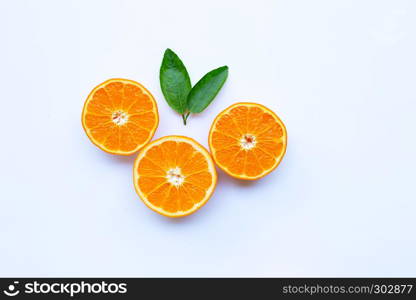 High vitamin C. Fresh orange citrus fruit with leaves isolated on white background.