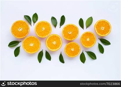 High vitamin C. Fresh orange citrus fruit with leaves isolated on white background.